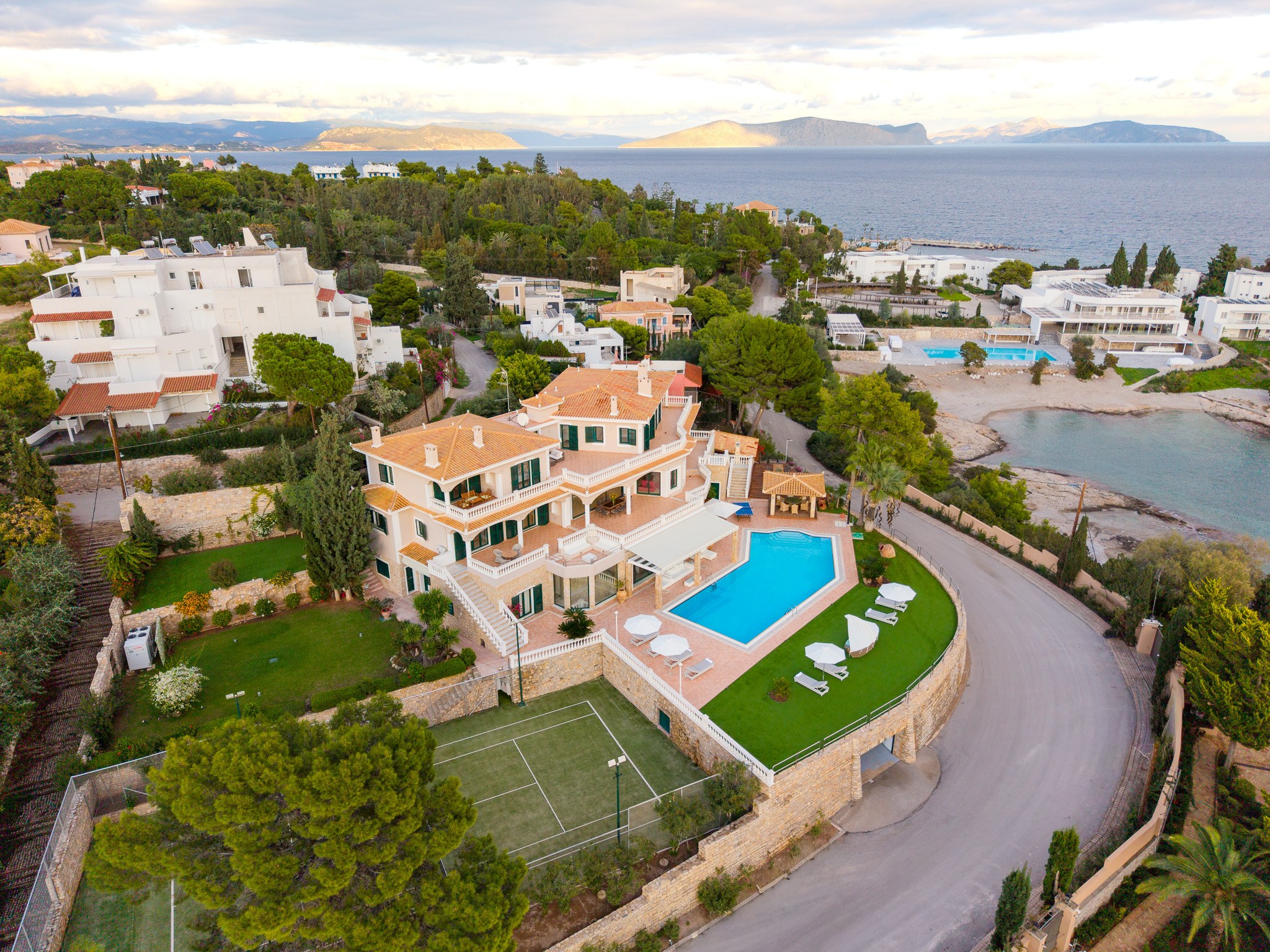 Villa Rafaella, golden-hour aerial of the estate and bay