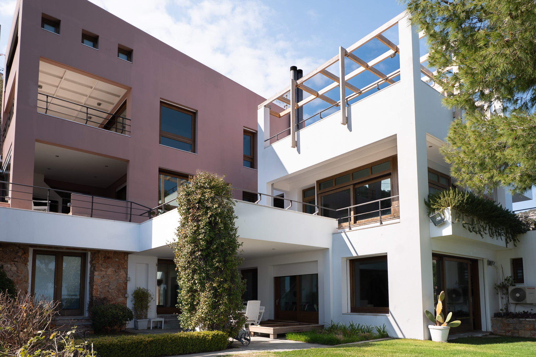 Villa Selene, rear elevation of pink and white volumes